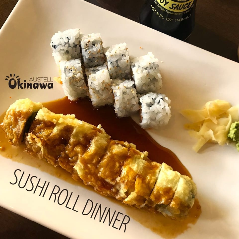 Okinawa's sushi roll dinner with a fried roll, regular rolls, ginger, wasabi, and soy sauce.